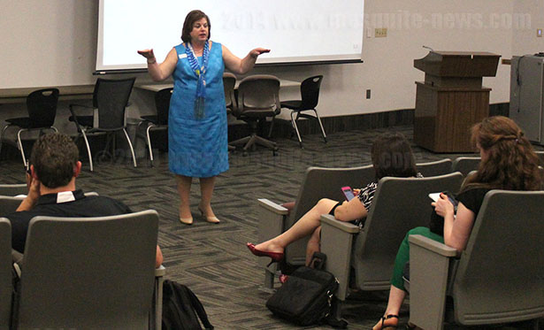 Dr. Melissa Mahan, vice president for student affairs, presents information and answers questions from students about guaranteed tuition and fee plans Wednesday in the auditorium at Brooks City Base Campus. The university's guaranteed tuition plan will go into effect Fall 14. Photo by Nayeli M Gomez