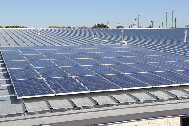 Solar Panels installed on the roof top of the Facilities Maintenance building of the South West Independent School District. The panels got installed about a month ago but just started working a week ago after workers from City Public Service inspected the system. Photo by Monica Lamadrid
