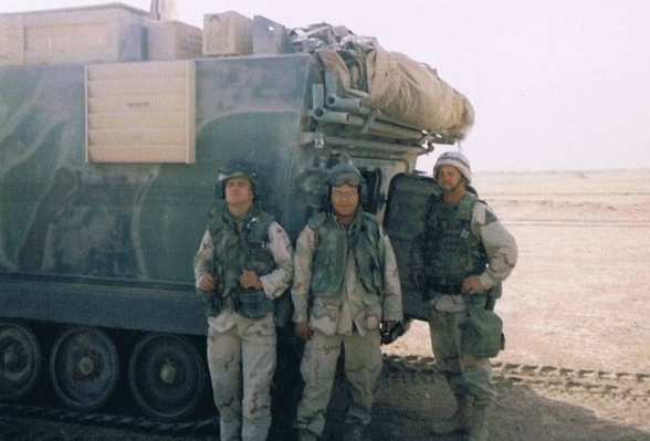 Robert Garcia Jr., middle, during the 2003 invasion of Iraq.