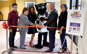 From Left to Right: Gregorio Gonzalez, freshman Business Management major, Dr. Melissa Mahan, Vice President of Student Affairs, Cynthia Teniente-Matson, Texas A&M – San Antonio President, General the Jaguar, Edwin Blanton, Executive Director of Experiential Learning & Community Engagement, Sherry Hardwick, Student Intern, cut the ribbon to General’s Store located on the first floor of Patriot’s Casa.
