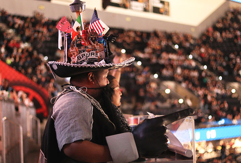 Fred Carrasco, aka "Spurachi", cheers on the San Antonio Spurs. Photo by David Mandujano